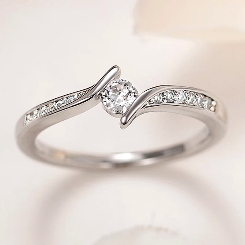 Elegant Minimalist Women's Ring with Shiny Round CZ Inlay - Perfect for Weddings and Engagements