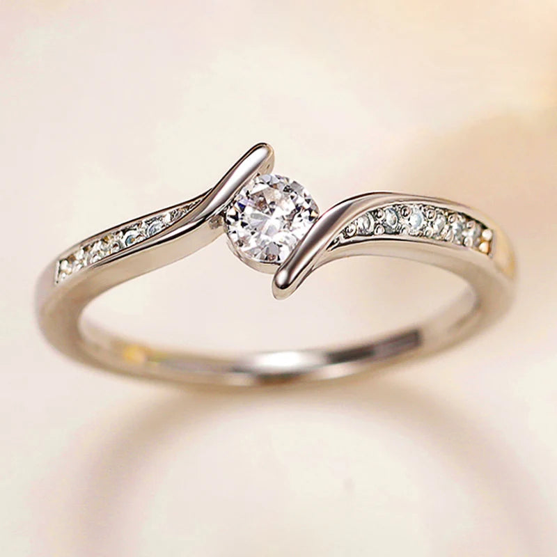 Elegant Minimalist Women's Ring with Shiny Round CZ Inlay - Perfect for Weddings and Engagements